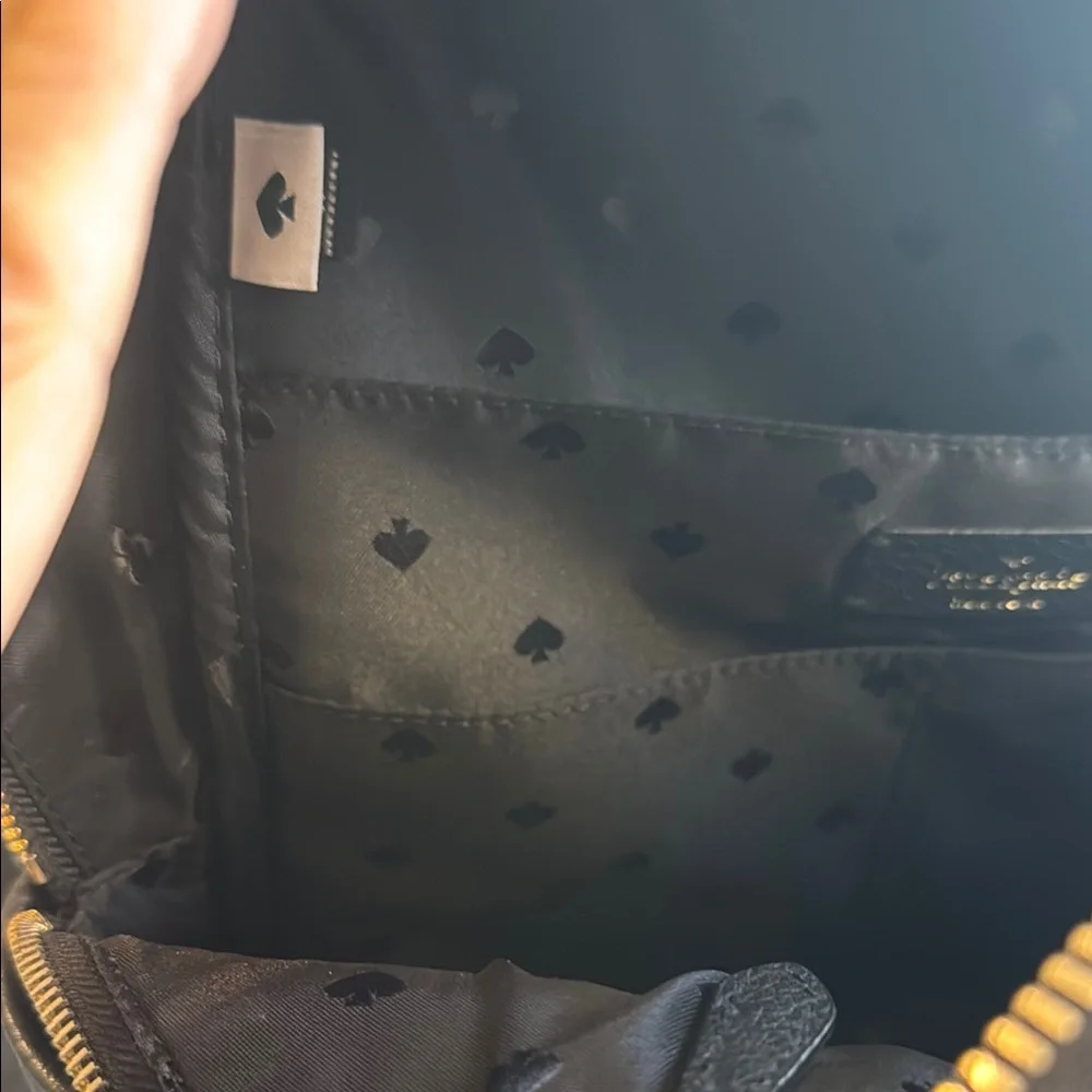kate spade Black Pebbled Leather Mini Backpack with Gold Accents